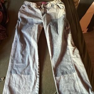 Woman’s baggy jeans